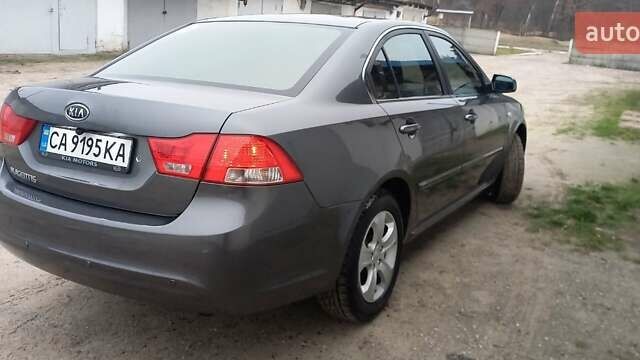 Сірий Кіа Маджентіс, об'ємом двигуна 2 л та пробігом 191 тис. км за 7700 $, фото 3 на Automoto.ua
