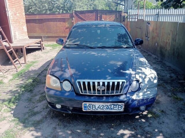 Синій Кіа Маджентіс, об'ємом двигуна 2 л та пробігом 1 тис. км за 1504 $, фото 4 на Automoto.ua