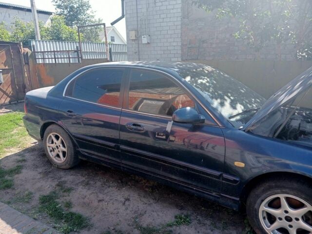 Синій Кіа Маджентіс, об'ємом двигуна 2 л та пробігом 1 тис. км за 1504 $, фото 3 на Automoto.ua