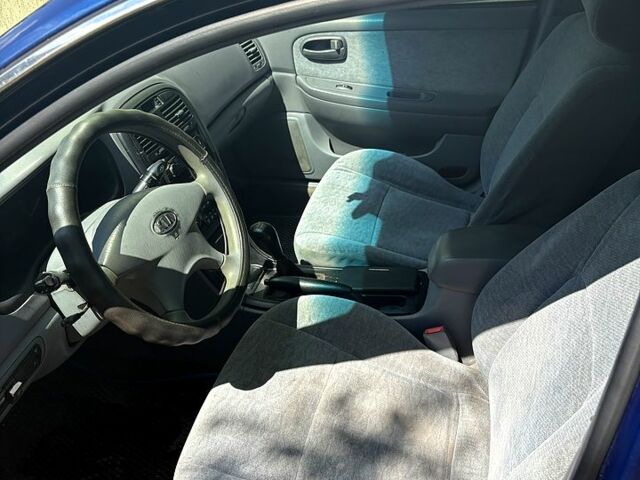 Синій Кіа Маджентіс, об'ємом двигуна 2 л та пробігом 380 тис. км за 2600 $, фото 4 на Automoto.ua