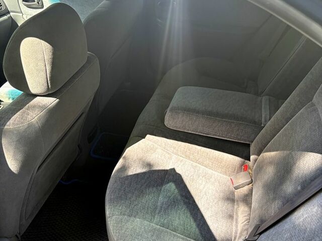 Синій Кіа Маджентіс, об'ємом двигуна 2 л та пробігом 380 тис. км за 2600 $, фото 6 на Automoto.ua