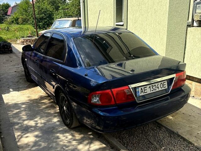 Синій Кіа Маджентіс, об'ємом двигуна 2 л та пробігом 380 тис. км за 2600 $, фото 2 на Automoto.ua