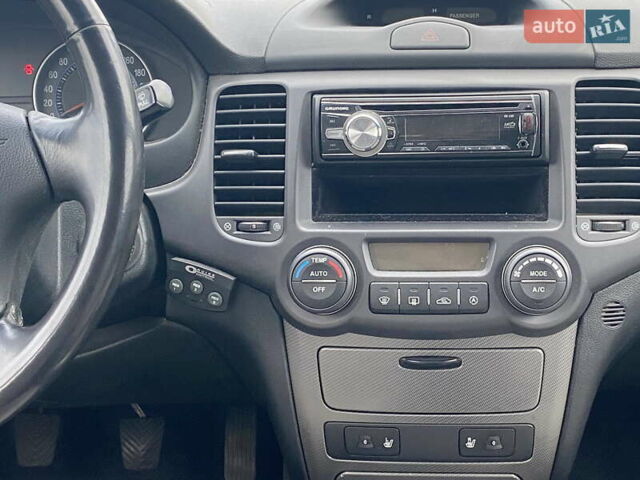 Синій Кіа Маджентіс, об'ємом двигуна 2 л та пробігом 249 тис. км за 5750 $, фото 14 на Automoto.ua