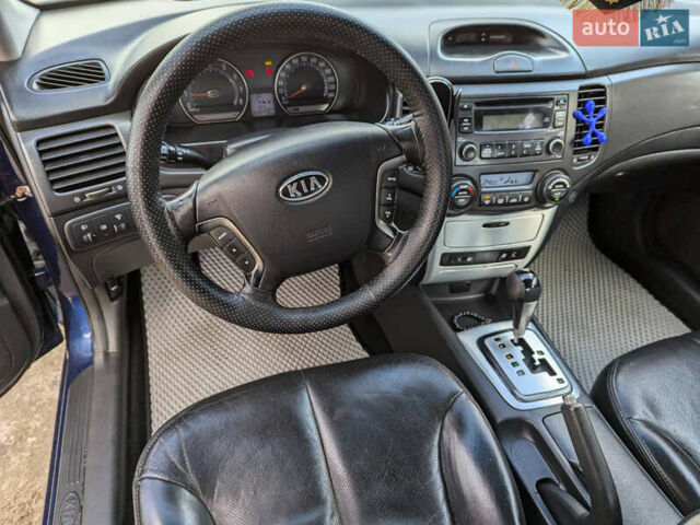 Синий Киа Маджентис, объемом двигателя 2 л и пробегом 220 тыс. км за 4500 $, фото 2 на Automoto.ua