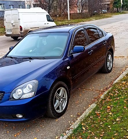 Синий Киа Маджентис, объемом двигателя 2.7 л и пробегом 383 тыс. км за 5500 $, фото 2 на Automoto.ua