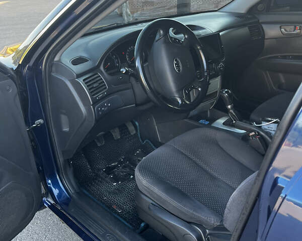 Синій Кіа Маджентіс, об'ємом двигуна 2 л та пробігом 135 тис. км за 7150 $, фото 8 на Automoto.ua