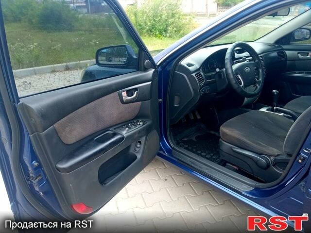 Синий Киа Маджентис, объемом двигателя 2 л и пробегом 218 тыс. км за 4500 $, фото 5 на Automoto.ua