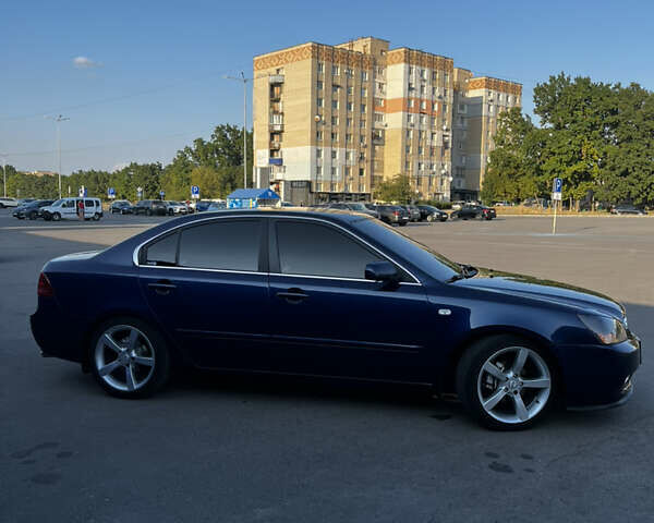 Синій Кіа Маджентіс, об'ємом двигуна 2 л та пробігом 135 тис. км за 7150 $, фото 1 на Automoto.ua