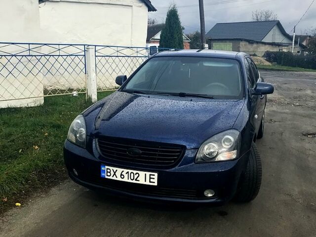 Синій Кіа Маджентіс, об'ємом двигуна 2 л та пробігом 237 тис. км за 5999 $, фото 2 на Automoto.ua