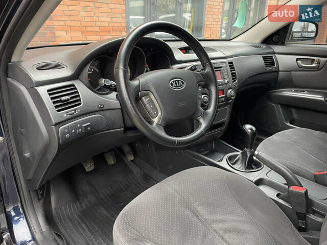 Синий Киа Маджентис, объемом двигателя 2 л и пробегом 295 тыс. км за 6200 $, фото 15 на Automoto.ua