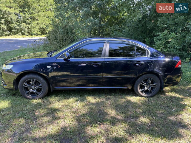 Синій Кіа Маджентіс, об'ємом двигуна 2 л та пробігом 203 тис. км за 7800 $, фото 7 на Automoto.ua