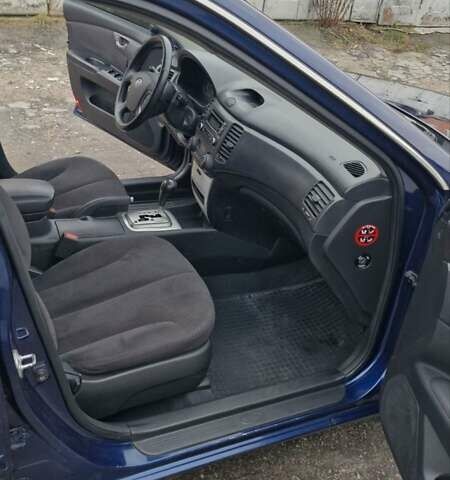 Синій Кіа Маджентіс, об'ємом двигуна 2 л та пробігом 110 тис. км за 5700 $, фото 6 на Automoto.ua