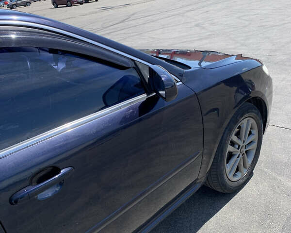 Синій Кіа Маджентіс, об'ємом двигуна 2 л та пробігом 203 тис. км за 6300 $, фото 4 на Automoto.ua