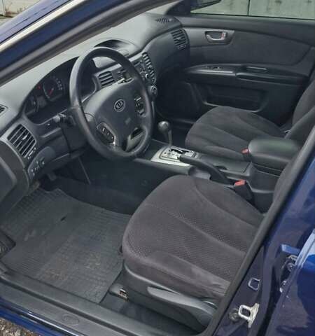 Синій Кіа Маджентіс, об'ємом двигуна 2 л та пробігом 110 тис. км за 5700 $, фото 10 на Automoto.ua