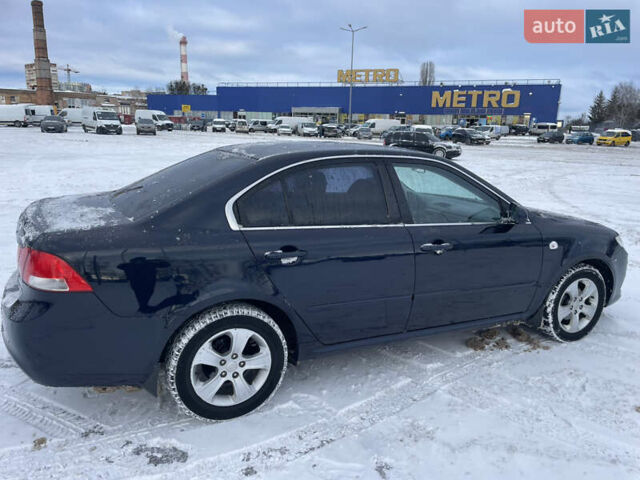 Синий Киа Маджентис, объемом двигателя 2 л и пробегом 156 тыс. км за 6950 $, фото 17 на Automoto.ua