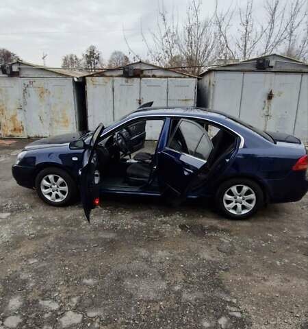 Синій Кіа Маджентіс, об'ємом двигуна 2 л та пробігом 110 тис. км за 5700 $, фото 5 на Automoto.ua