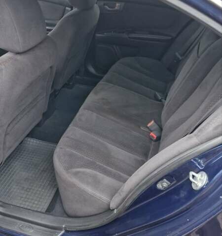 Синій Кіа Маджентіс, об'ємом двигуна 2 л та пробігом 110 тис. км за 5700 $, фото 8 на Automoto.ua