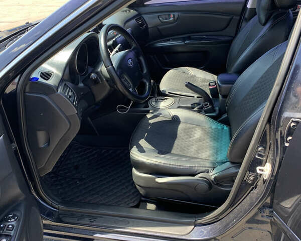 Синій Кіа Маджентіс, об'ємом двигуна 2 л та пробігом 203 тис. км за 6300 $, фото 14 на Automoto.ua