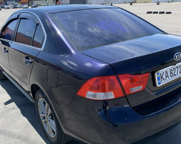 Синій Кіа Маджентіс, об'ємом двигуна 2 л та пробігом 203 тис. км за 6300 $, фото 7 на Automoto.ua
