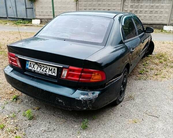 Зеленый Киа Маджентис, объемом двигателя 2 л и пробегом 350 тыс. км за 2000 $, фото 3 на Automoto.ua