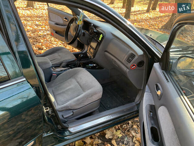 Киа Маджентис 2002 в Хмельницком на Automoto.ua Зеленый Киа Маджентис, объемом двигателя 2 л и пробегом 377 тыс. км за 2300 $, фото 10 на Automoto.ua