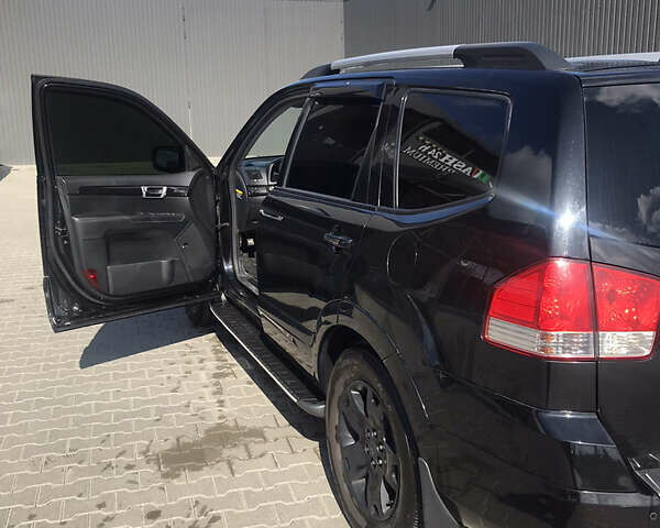 Чорний Кіа Мохаве, об'ємом двигуна 3 л та пробігом 222 тис. км за 12500 $, фото 8 на Automoto.ua