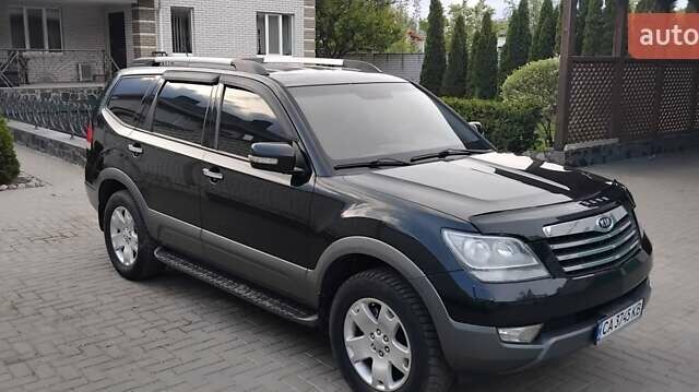 Черный Киа Мохаве, объемом двигателя 3.78 л и пробегом 180 тыс. км за 12300 $, фото 1 на Automoto.ua