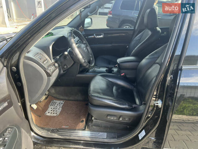 Чорний Кіа Мохаве, об'ємом двигуна 3 л та пробігом 309 тис. км за 13500 $, фото 11 на Automoto.ua