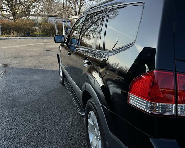 Черный Киа Мохаве, объемом двигателя 2.96 л и пробегом 143 тыс. км за 15900 $, фото 5 на Automoto.ua