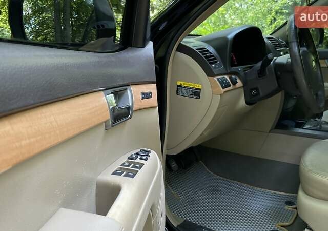 Черный Киа Мохаве, объемом двигателя 2.96 л и пробегом 315 тыс. км за 12500 $, фото 12 на Automoto.ua