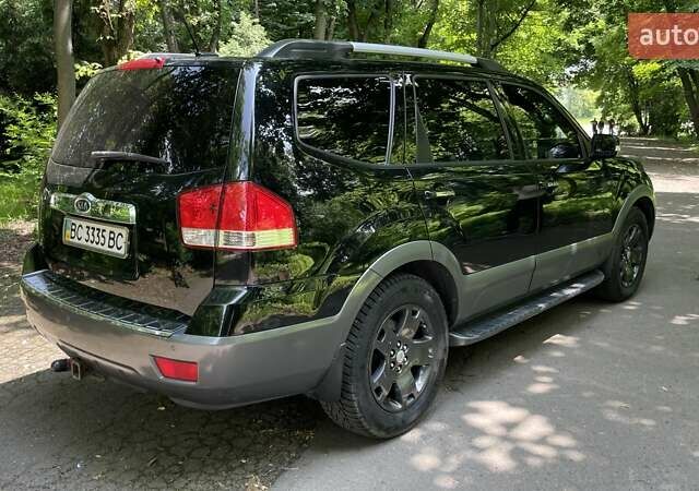 Черный Киа Мохаве, объемом двигателя 2.96 л и пробегом 315 тыс. км за 12500 $, фото 8 на Automoto.ua