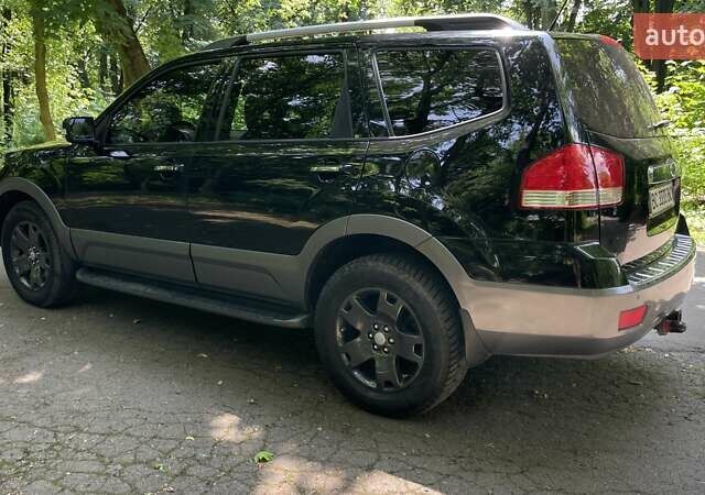 Черный Киа Мохаве, объемом двигателя 2.96 л и пробегом 315 тыс. км за 12500 $, фото 7 на Automoto.ua