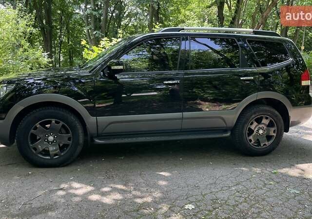 Черный Киа Мохаве, объемом двигателя 2.96 л и пробегом 315 тыс. км за 12500 $, фото 5 на Automoto.ua