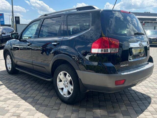 Черный Киа Мохаве, объемом двигателя 3 л и пробегом 194 тыс. км за 13990 $, фото 4 на Automoto.ua