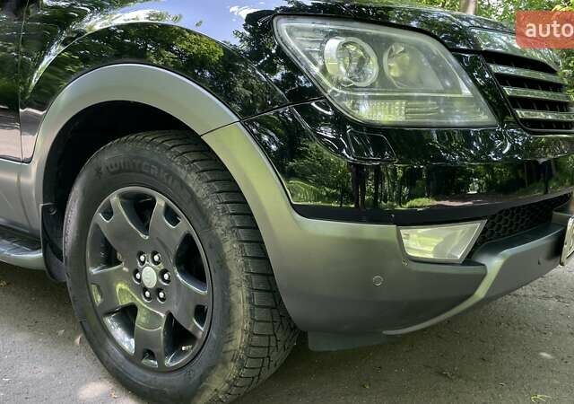Черный Киа Мохаве, объемом двигателя 2.96 л и пробегом 315 тыс. км за 12500 $, фото 21 на Automoto.ua