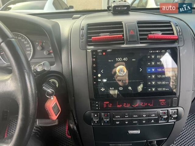 Серый Киа Мохаве, объемом двигателя 3.78 л и пробегом 118 тыс. км за 14000 $, фото 19 на Automoto.ua