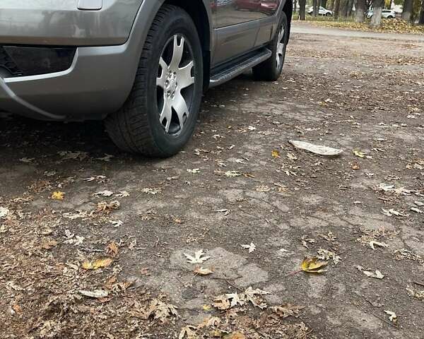 Серый Киа Мохаве, объемом двигателя 3.78 л и пробегом 293 тыс. км за 11500 $, фото 8 на Automoto.ua