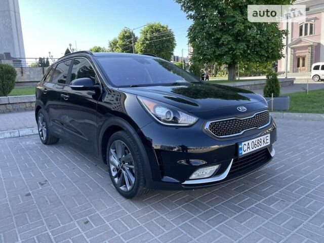 Черный Киа Niro, объемом двигателя 1.58 л и пробегом 98 тыс. км за 15650 $, фото 2 на Automoto.ua