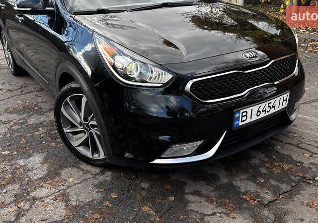 Черный Киа Niro, объемом двигателя 1.58 л и пробегом 103 тыс. км за 16000 $, фото 1 на Automoto.ua