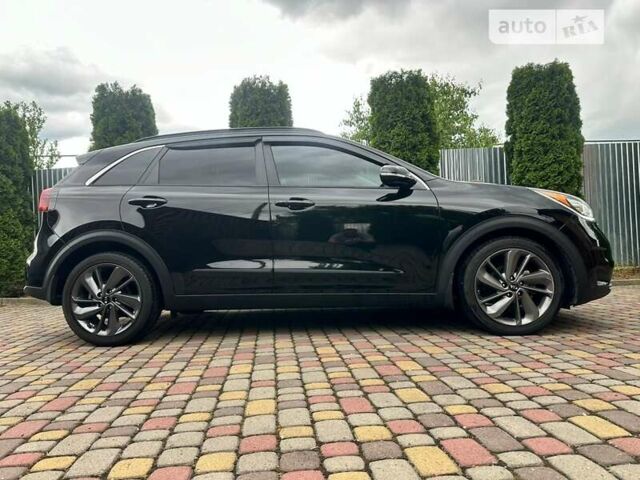 Чорний Кіа Niro, об'ємом двигуна 1.58 л та пробігом 231 тис. км за 14600 $, фото 5 на Automoto.ua