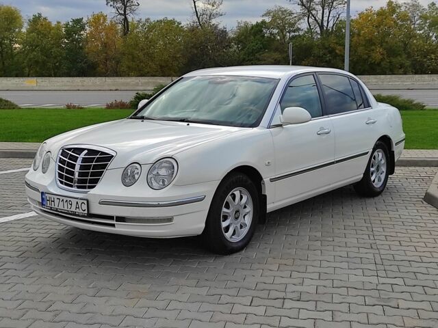Белый Киа Опирус, объемом двигателя 3.5 л и пробегом 136 тыс. км за 5500 $, фото 1 на Automoto.ua