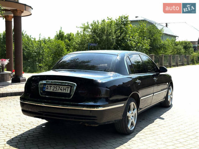 Черный Киа Опирус, объемом двигателя 3.5 л и пробегом 320 тыс. км за 4600 $, фото 4 на Automoto.ua
