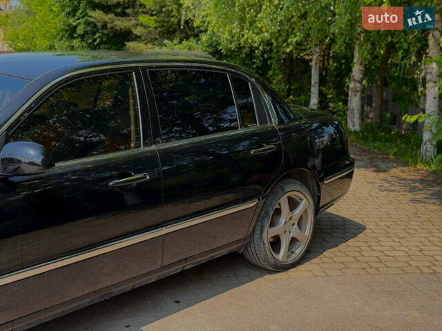 Черный Киа Опирус, объемом двигателя 3.5 л и пробегом 320 тыс. км за 4600 $, фото 8 на Automoto.ua