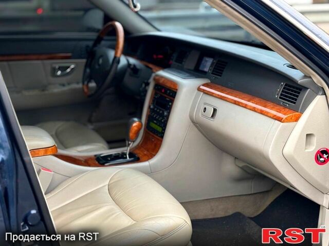 Чорний Кіа Опірус, об'ємом двигуна 3.5 л та пробігом 150 тис. км за 3900 $, фото 6 на Automoto.ua