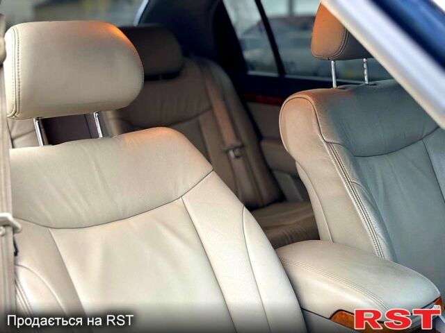 Чорний Кіа Опірус, об'ємом двигуна 3.5 л та пробігом 150 тис. км за 3900 $, фото 9 на Automoto.ua