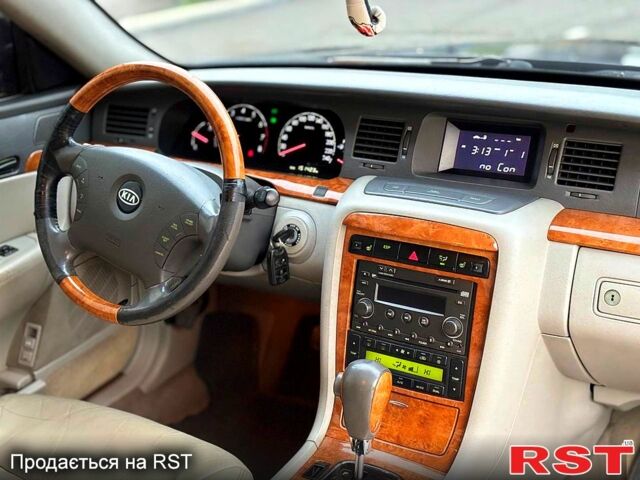 Чорний Кіа Опірус, об'ємом двигуна 3.5 л та пробігом 150 тис. км за 3900 $, фото 8 на Automoto.ua