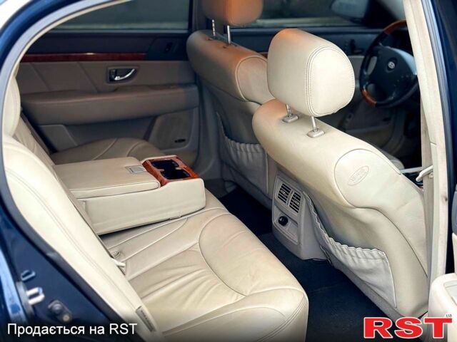 Чорний Кіа Опірус, об'ємом двигуна 3.5 л та пробігом 150 тис. км за 3900 $, фото 7 на Automoto.ua