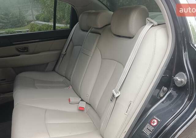 Черный Киа Опирус, объемом двигателя 3.78 л и пробегом 185 тыс. км за 6800 $, фото 17 на Automoto.ua