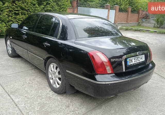 Черный Киа Опирус, объемом двигателя 3.78 л и пробегом 185 тыс. км за 6800 $, фото 6 на Automoto.ua