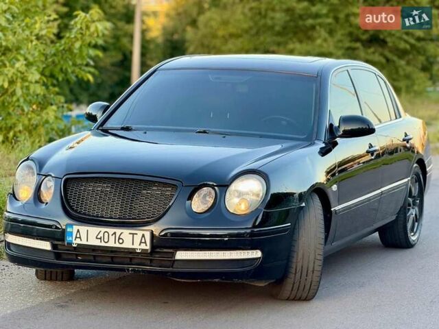 Черный Киа Опирус, объемом двигателя 3.8 л и пробегом 225 тыс. км за 6500 $, фото 2 на Automoto.ua